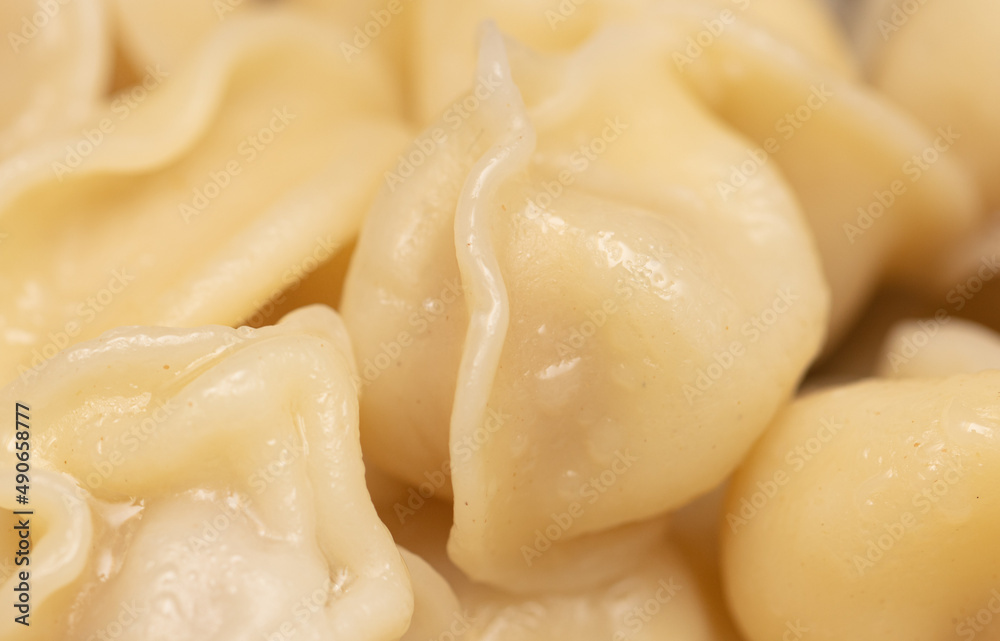 Boiled dumplings made from dough and meat. Boiled dumplings made from dough and meat.