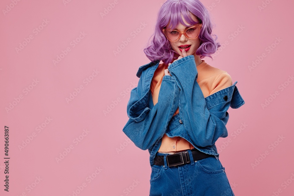 Positive young woman purple hairstyle red lips denim jacket fun color background unaltered Positive young woman purple hairstyle red lips denim jacket fun color background unaltered