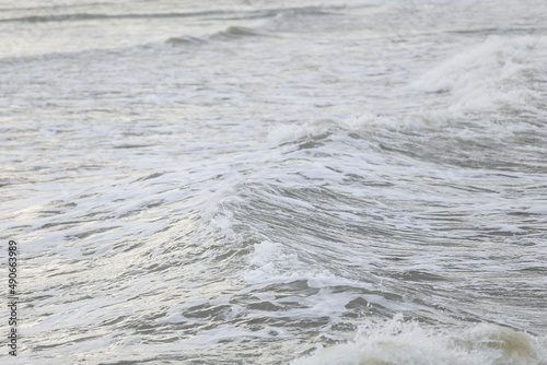 close up baltic sea water vawes texture details near baltic shore.