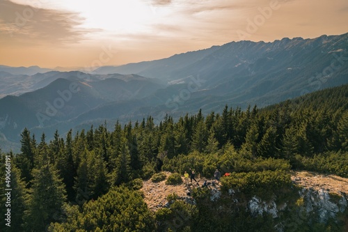 Aerial of Poiana Zanoaga in valley, Piatra Craiului natural reserve from Romania. Piatra Mica or Cabana Curmatura in Piatra Craiului National Park