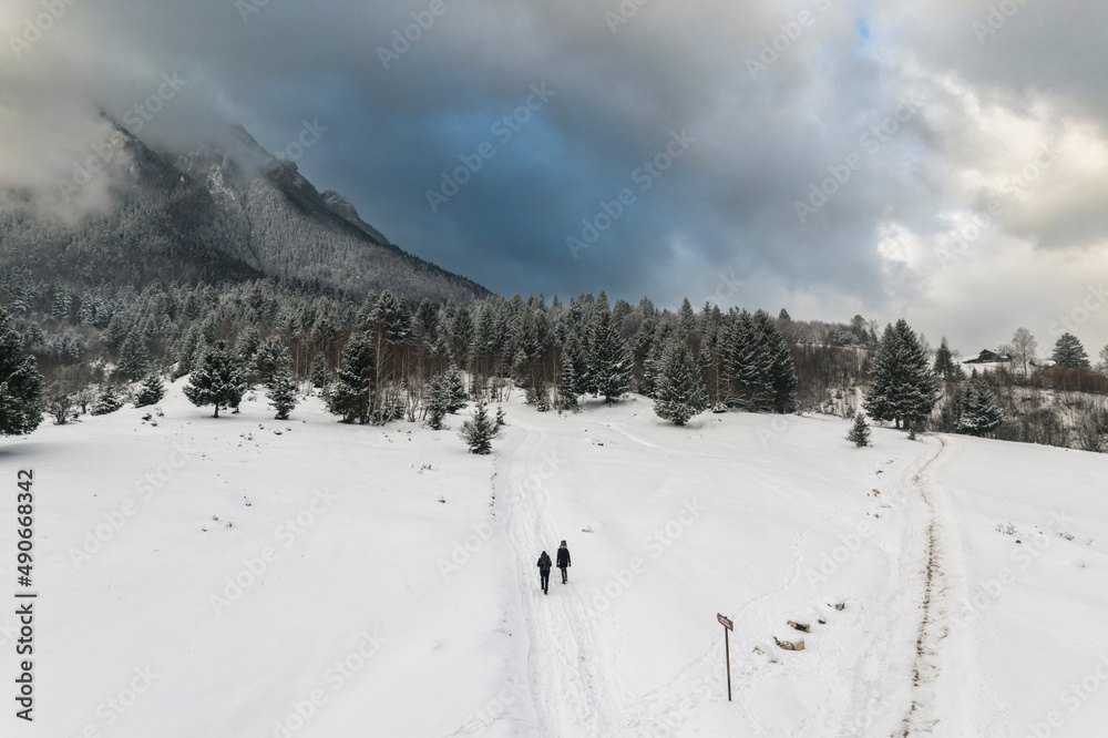 Aerial of Plaiul Foii in Zarnesti, Brasov. Piatra Craiului hiking above the clouds, near Piatra Mica or Cabana Curmatura. Piatra Craiului mountains in the Southern Carpathians in Romania