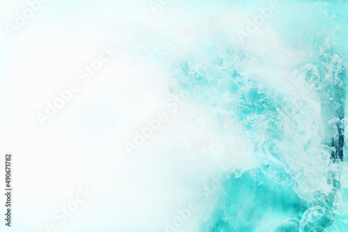 Green smoke on white ink background, colorful fog, abstract swirling emerald ocean sea, acrylic paint pigment underwater © amixstudio