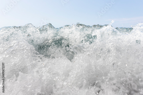 Wave splash at sea. Closeup of a splashing water