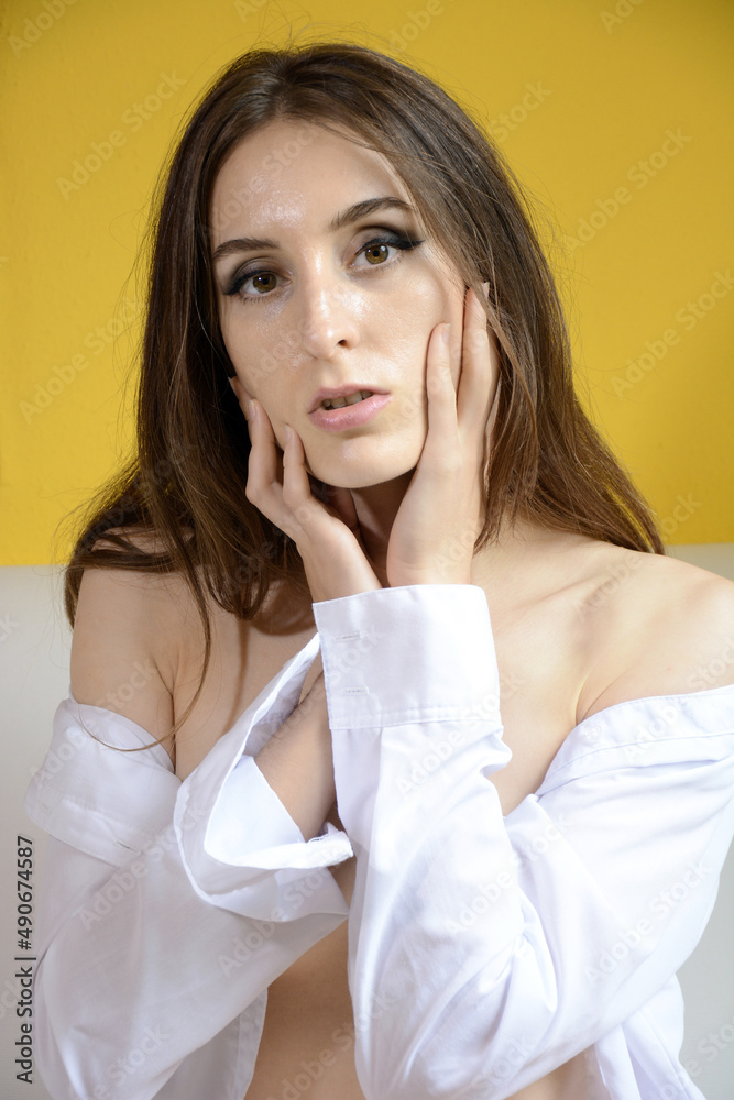 Portrait of a gorgeous sensual brunette woman at home
Portrait of a gorgeous sensual brunette woman at home