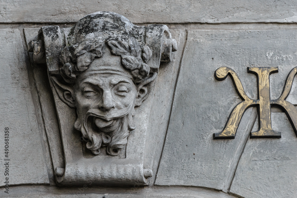 Elements of architectural decorations of buildings, sculptures and