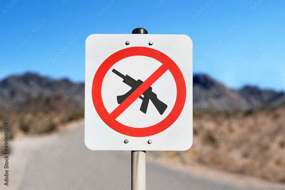 No weapons sign with machine gun crossed out in red