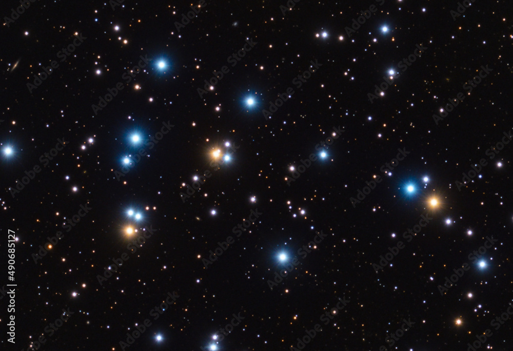 M44 star cluster in constellation of Cancer. Photographed with star-tracker and telescope with long exposure. M44 star cluster in constellation of Cancer. Photographed with star-tracker and telescope with long exposure.