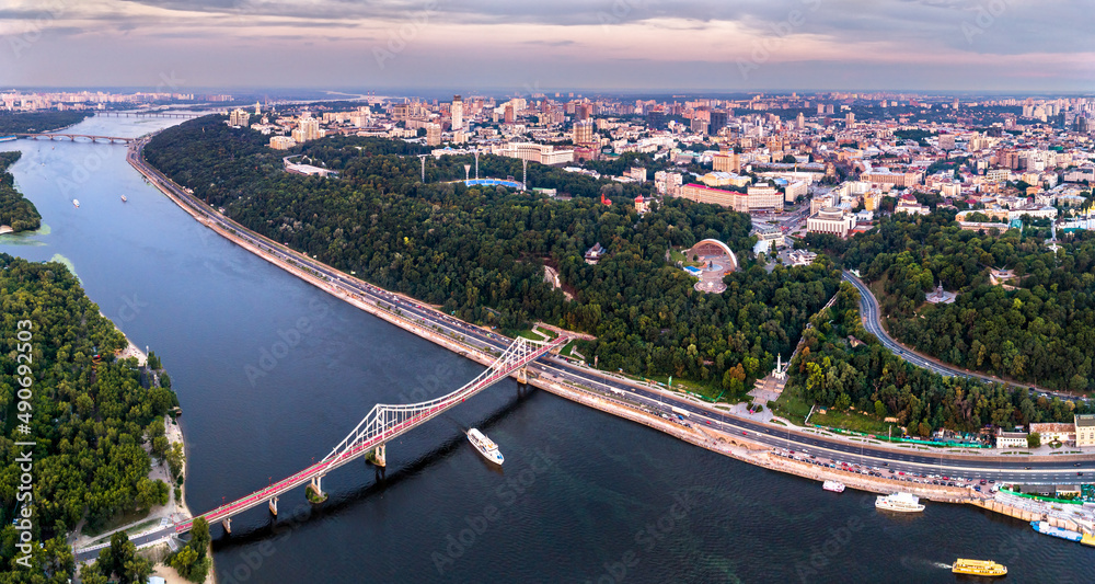 Aerial view of the Dnieper river with the Pedestrian Bridge in Kiev, Ukraine, before the Russian attack