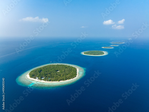 Aerial view of tropical islands in Baa Atoll, Maldives photo