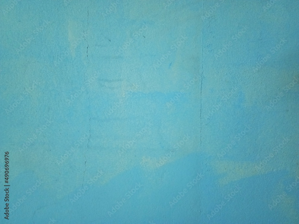 Old blue cement wall background in vintage style