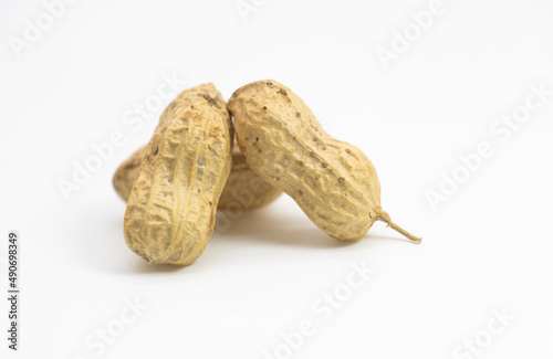 peeled peanuts isolated on white background.