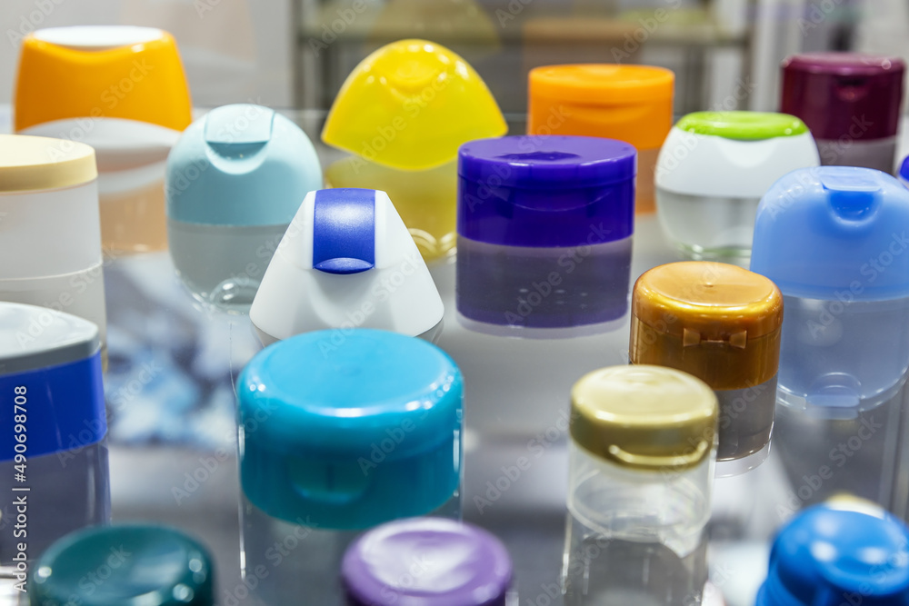 plastic lids of different shapes and purposes in different colors plastic lids of different shapes and purposes in different colors