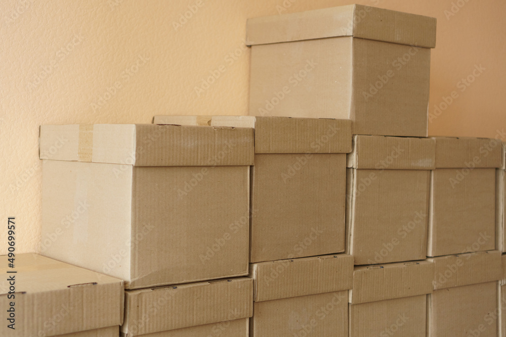 Set of cardboard brown boxes in storehouse. Background of carton boxes in wsrehouse Set of cardboard brown boxes in storehouse. Background of carton boxes in wsrehouse