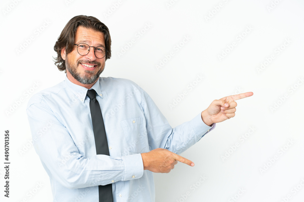 Senior dutch business man isolated on white background pointing finger to the side and presenting a product Senior dutch business man isolated on white background pointing finger to the side and presenting a product