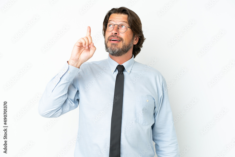 Senior dutch business man isolated on white background intending to realizes the solution while lifting a finger up Senior dutch business man isolated on white background intending to realizes the solution while lifting a finger up