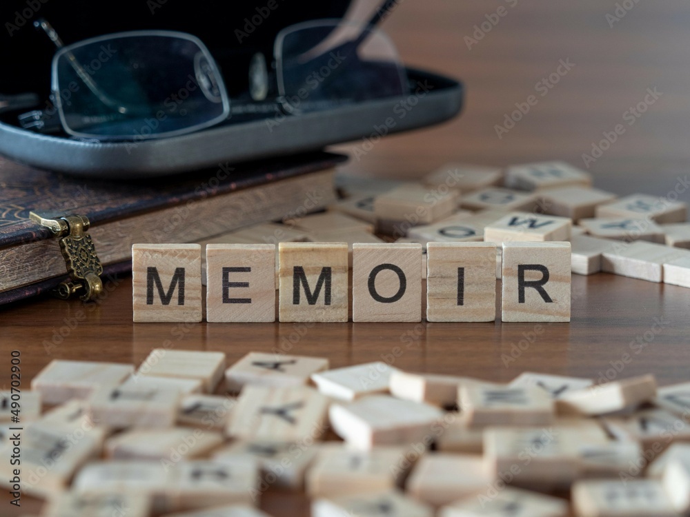 memoir word or concept represented by wooden letter tiles on a wooden table with glasses and a book - obrazy, fototapety, plakaty 
