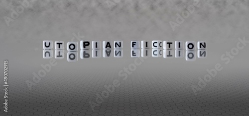 utopian fiction word or concept represented by black and white letter cubes on a grey horizon background stretching to infinity