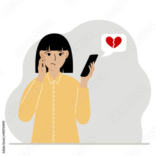 Sad woman reading a message on his mobile phone. Message with a broken red heart. Vector