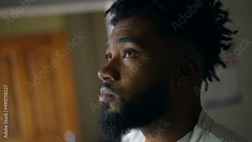 Pensive young man thinking about life a thoughtful African American