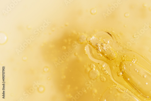 Bilde på lerret Vitamin C serum liquid texture with dropper, macro shot.
