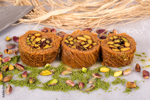 Canvas Print Turkish bird's nest baklava sweet dessert in tray ready to be served