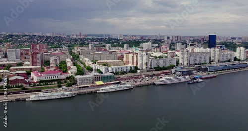 The city of Krasnoyarsk, the pier of ships, the embankment, the flight over the city.