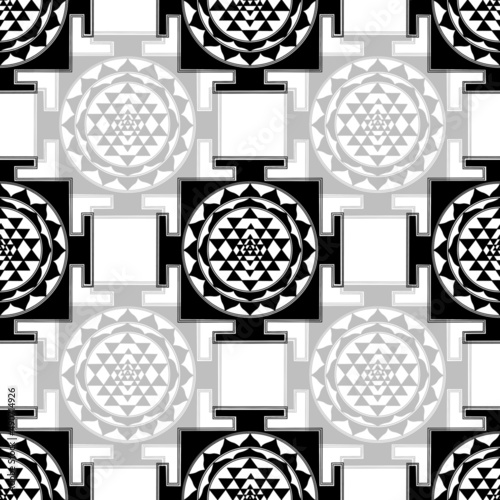 Indian spiritual mandala in black and white geyscale. It is a traditional pattern called Sri Yantra, Shri Yantra or Shree Chakra. This is a repeating pattern vector design, can be extended infinitely.