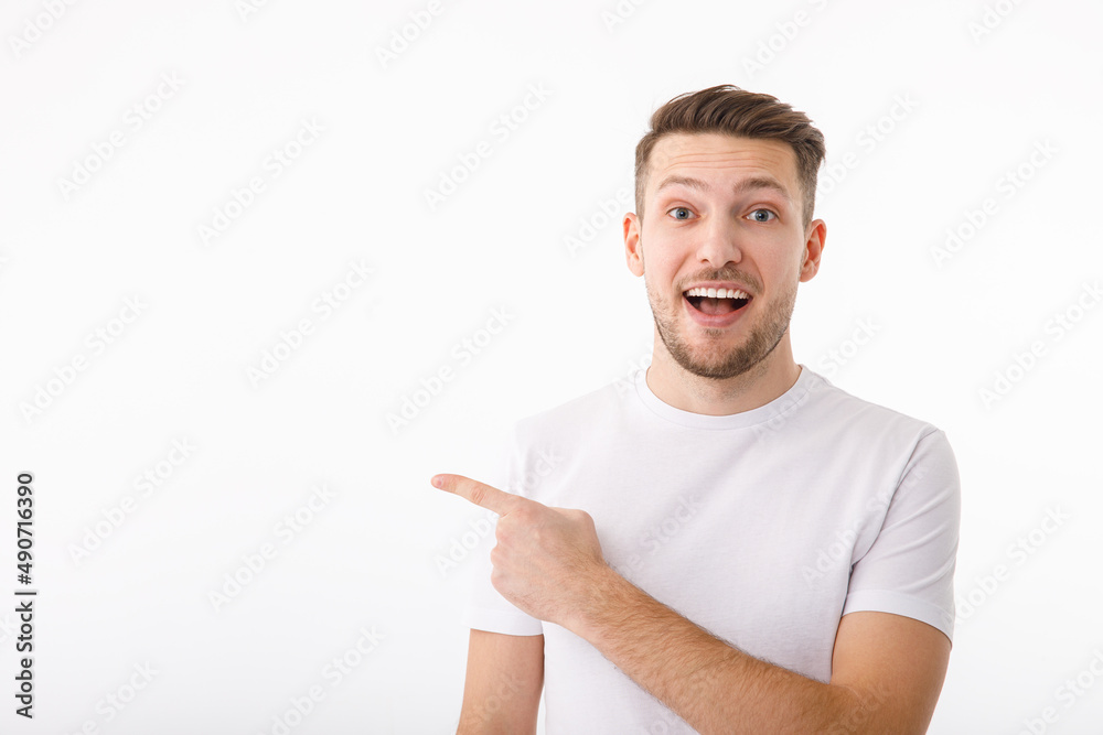 Portrait of a men on a white background pointing gesture to copyspace. Portrait of a men on a white background pointing gesture to copyspace.