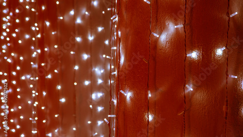 background blurred abstraction of colored lanterns and decorations. bokeh texture of street colored lights