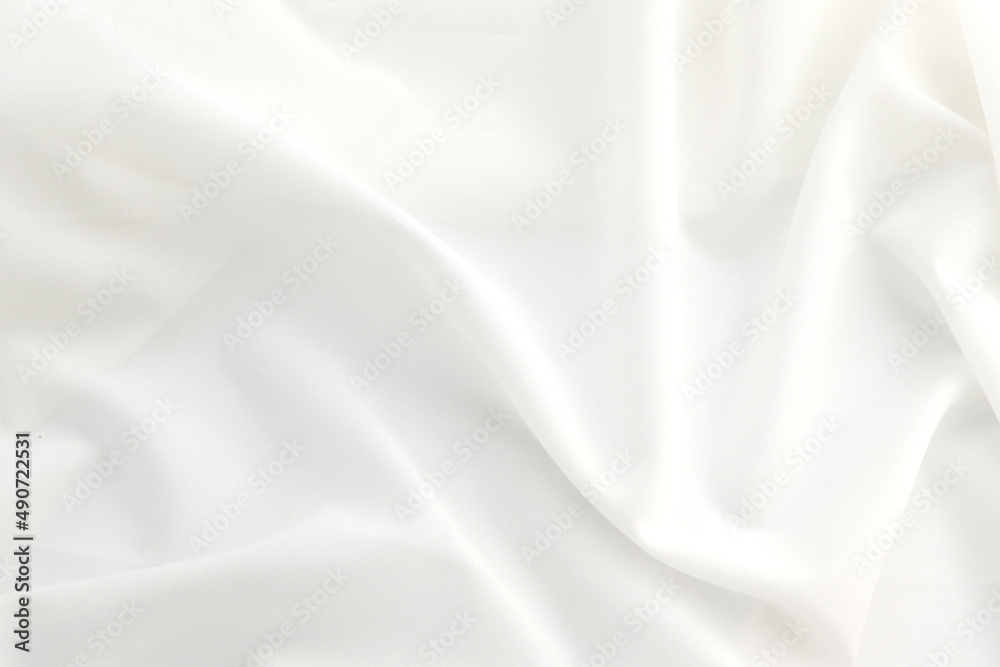 Smooth elegant white silk or elegant satin texture can be used as background, elegant wedding background design.