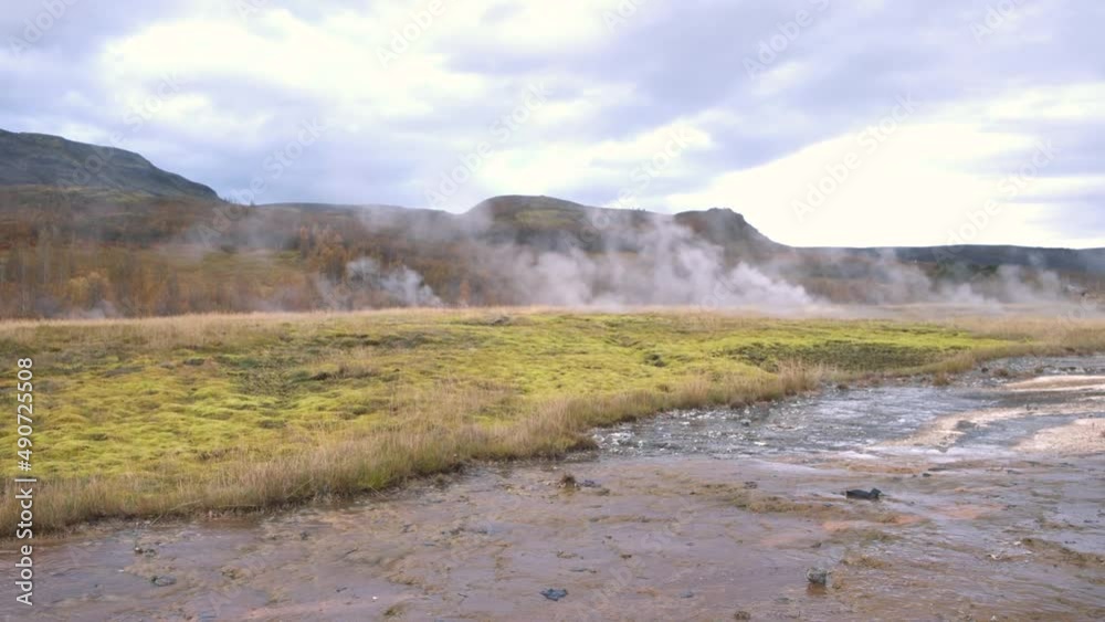 Steam rising out of Strokkur geyser mud pools and springs, Iceland. Steam rising out of Strokkur geyser mud pools and springs, Iceland.