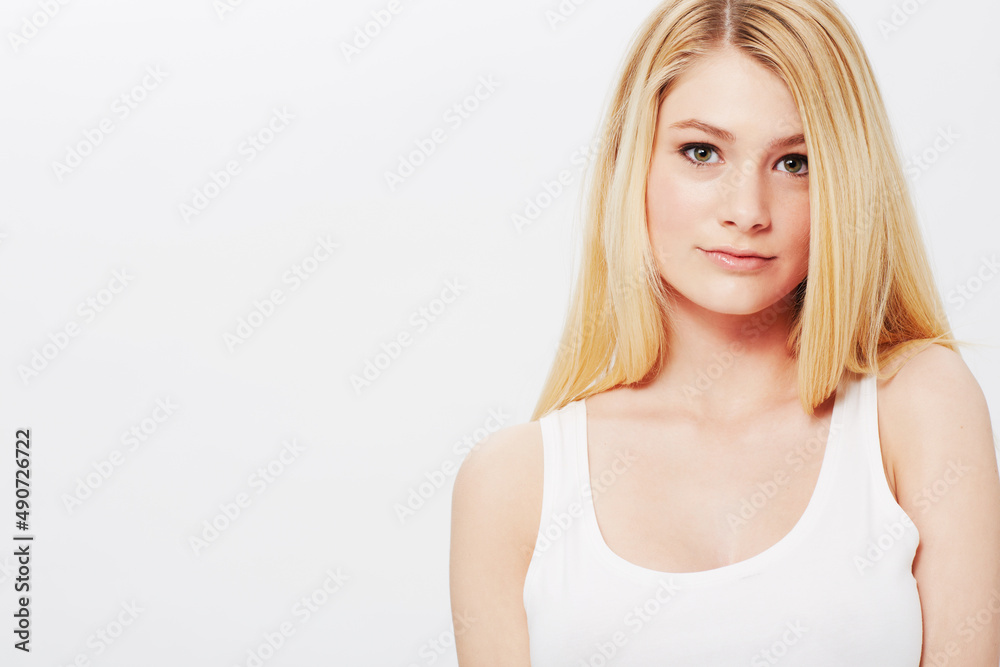 Natural, young and absolutely gorgeous. A pretty young blonde isolated on a white background. Natural, young and absolutely gorgeous. A pretty young blonde isolated on a white background.