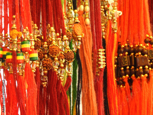Temple shops colorful beaded dhaga string with rudrakhs in display