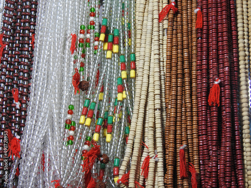 Temple shops colorful beaded dhaga string with rudrakhs in display