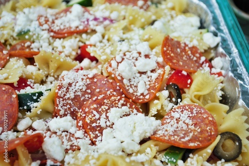 Closeup of italian pasta salad at a picnic