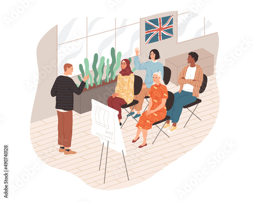 Learning English. Group of young people in the classroom with teacher.