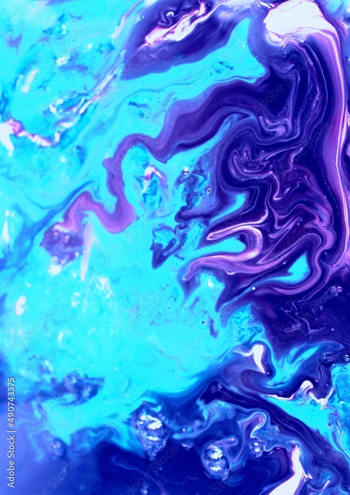 Purple-blue marble background. Acrylic paint flows freely and creates an interesting pattern. Background for the cover of a laptop, laptop, book.