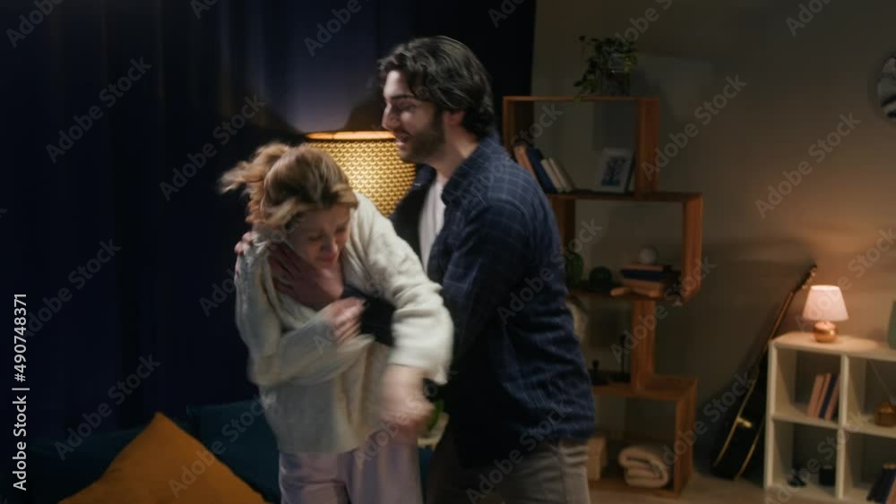 Man and woman fighting, couple quarreling at home, husband and wife shouting at each other and waving their hands. Scandal and crisis, family problems. Domestic violence, abuse.