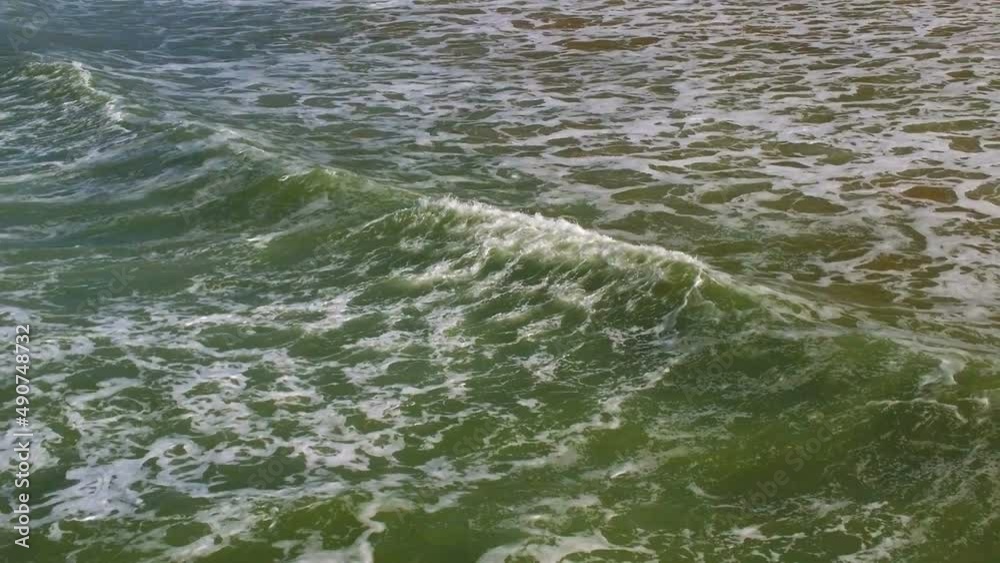 Ocean, sunlight, colors on water. sea wave, water foam. Beach, Aerial view Ocean, sunlight, colors on water. sea wave, water foam. Beach, Aerial view
