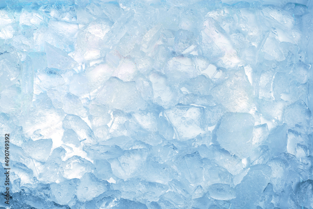 Abstract ice texture. Icy chunks on the surface. Top view close up. Fragments of crystals of irregular shape Abstract ice texture. Icy chunks on the surface. Top view close up. Fragments of crystals of irregular shape