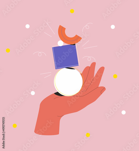 Balance and Harmony. Hand holding different geometric shapes that balanced. 