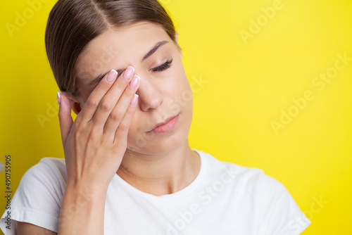 Young Woman Holding Her Head In Pain Suffering From A Headache