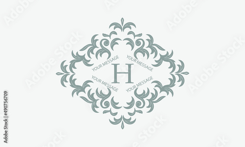 Exquisite floral logo with calligraphic letter H. Business sign, identity monogram for restaurant, boutique, hotel, heraldic, jewelry.