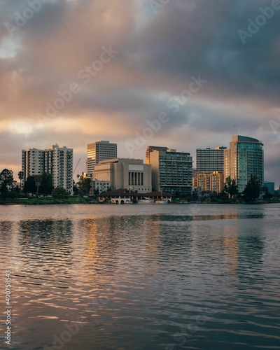 Sunset view of the downtown skyline with Lake Merritt  in downtown Oakland  California