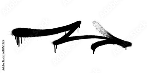 Graffiti arrow with overspray in black over white.