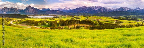 panoramic landscape in Bavaria with mountain range and lake © Wolfilser