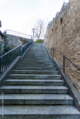 Empty flight of exterior stairs alongside a wall