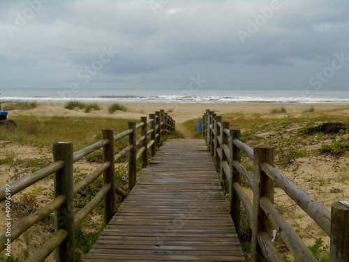 Small wooden walkway leading to the beach  Laguna  SC  Brazil