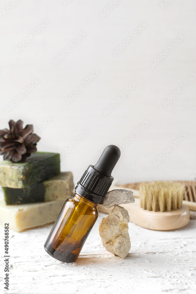 Naklejka premium Eco cosmetic products for skin care of the face, body. Glass cosmetic bottles with natural essential oil, vitamin and prebiotic serum for health. banner