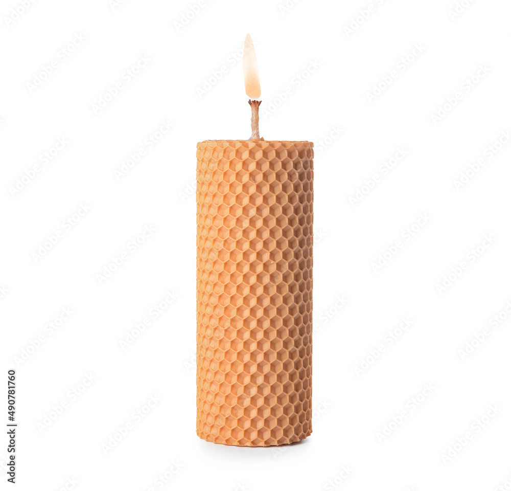Burning wax candle isolated on white background Burning wax candle isolated on white background